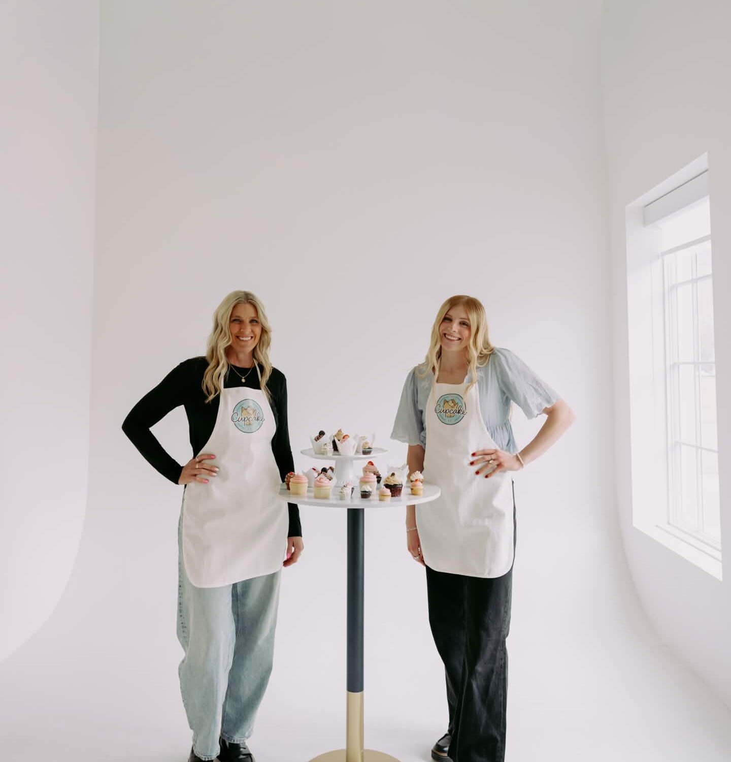 Sherri and Hallie with cupcake display